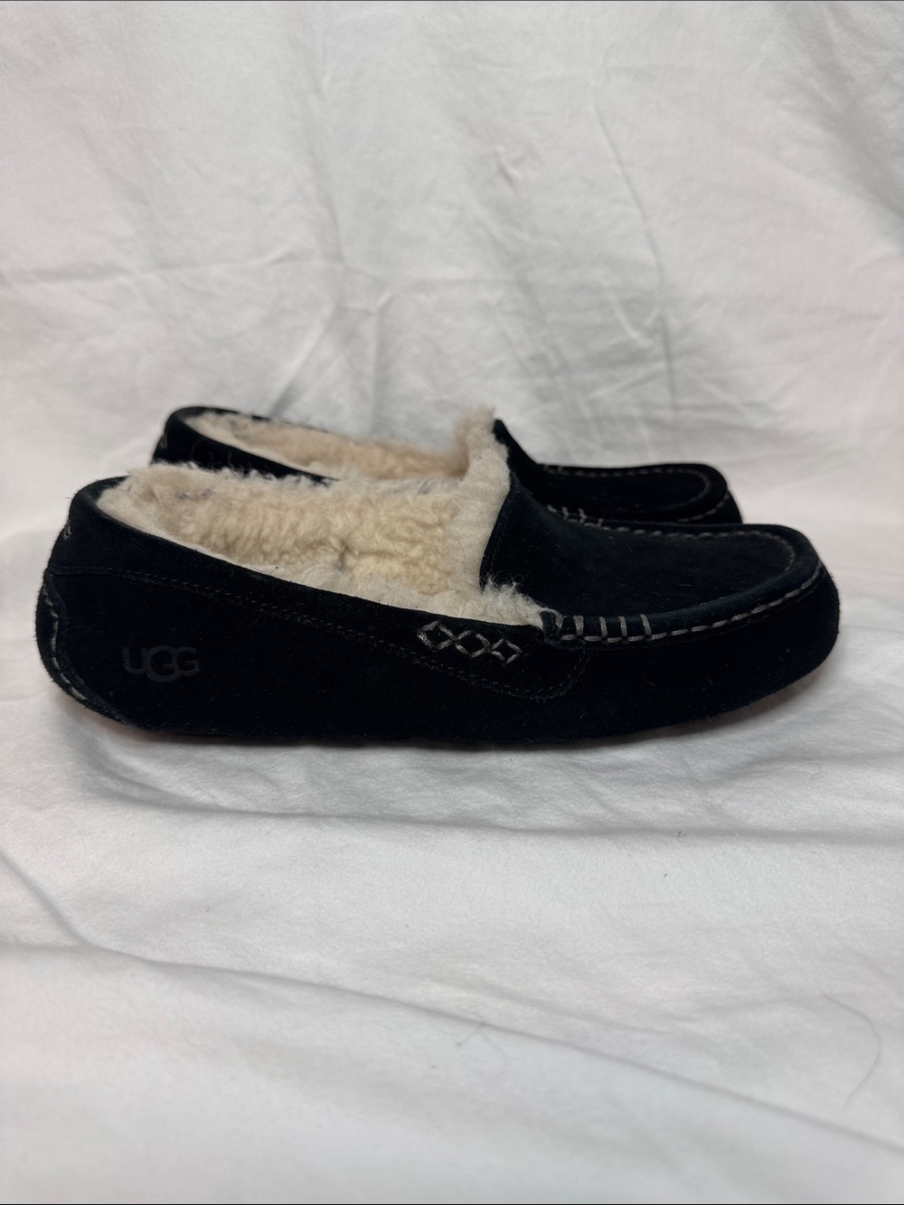 UGG women’s Black Suede Shearling Moccasin Slippers